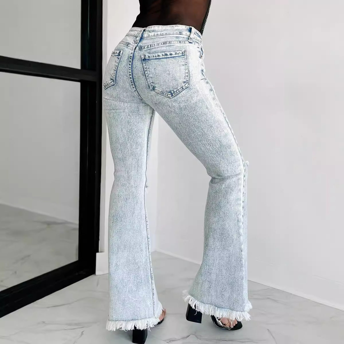 Damen Flared Jeans mit modischen Fransen und Rissen Stalluxe