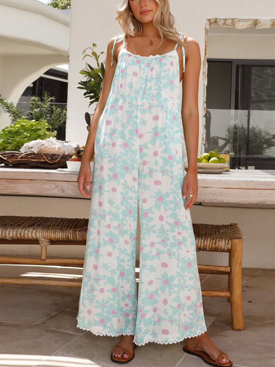 Damen luftiges Sommer-Jumpsuit mit Blumendruck und verstellbaren Trägern Stalluxe