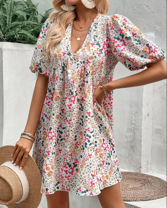 Damen Verspieltes Blümchenkleid mit Puffärmeln und V-Ausschnitt Stalluxe