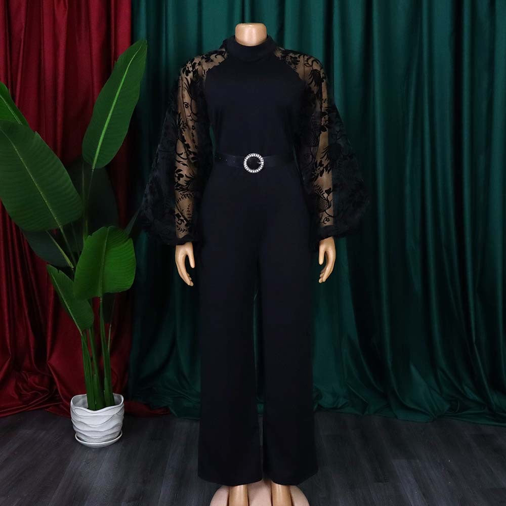 Damen Eleganter Jumpsuit mit transparenten Puffärmeln und tailliertem Gürtel Stalluxe