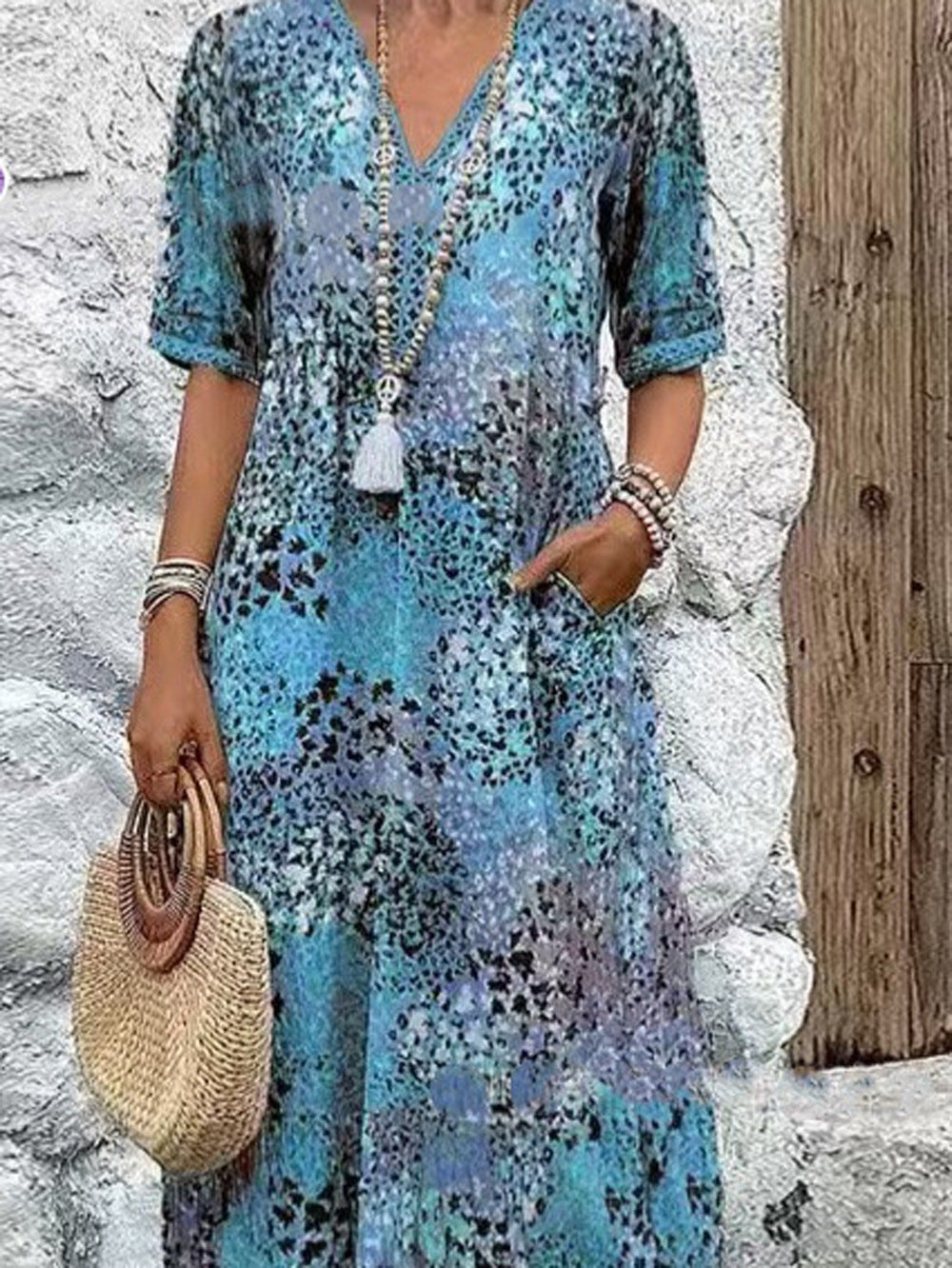 Damen Modisches Freizeitkleid mit floralem Muster und seitlichen Taschen Stalluxe