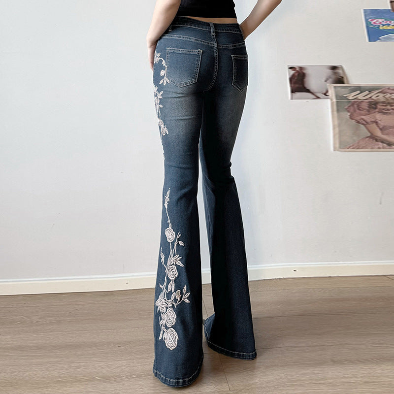 Damen ausgestellte Jeans mit floralen Applikationen Stalluxe