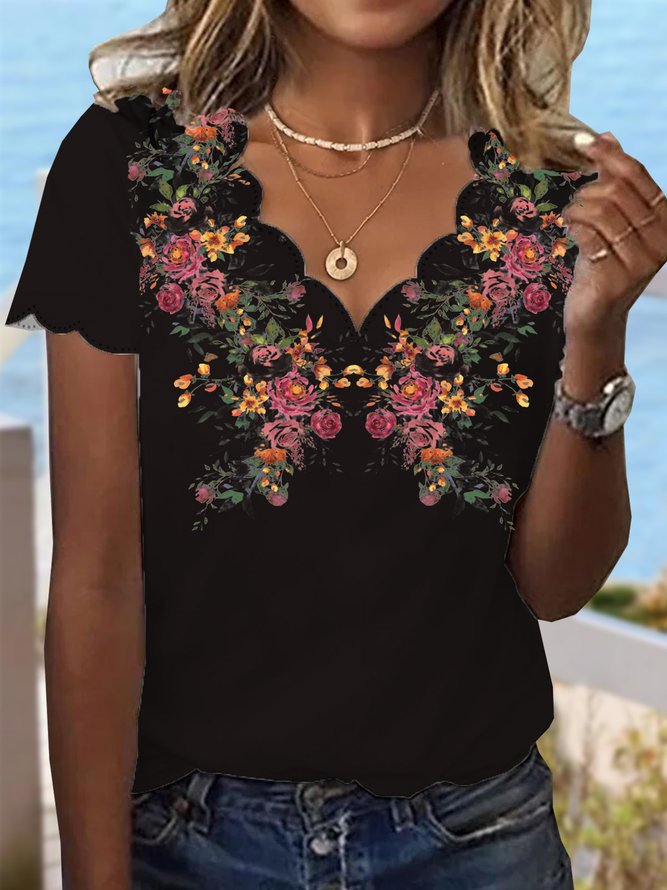 Damen Elegante Bluse mit floralen Stickereien und asymmetrischem Saum Stalluxe