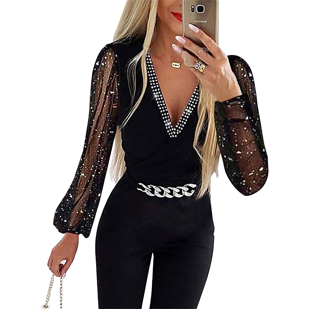 Damen Eleganter Jumpsuit mit transparenten Puffärmeln und Glitzerakzenten Stalluxe