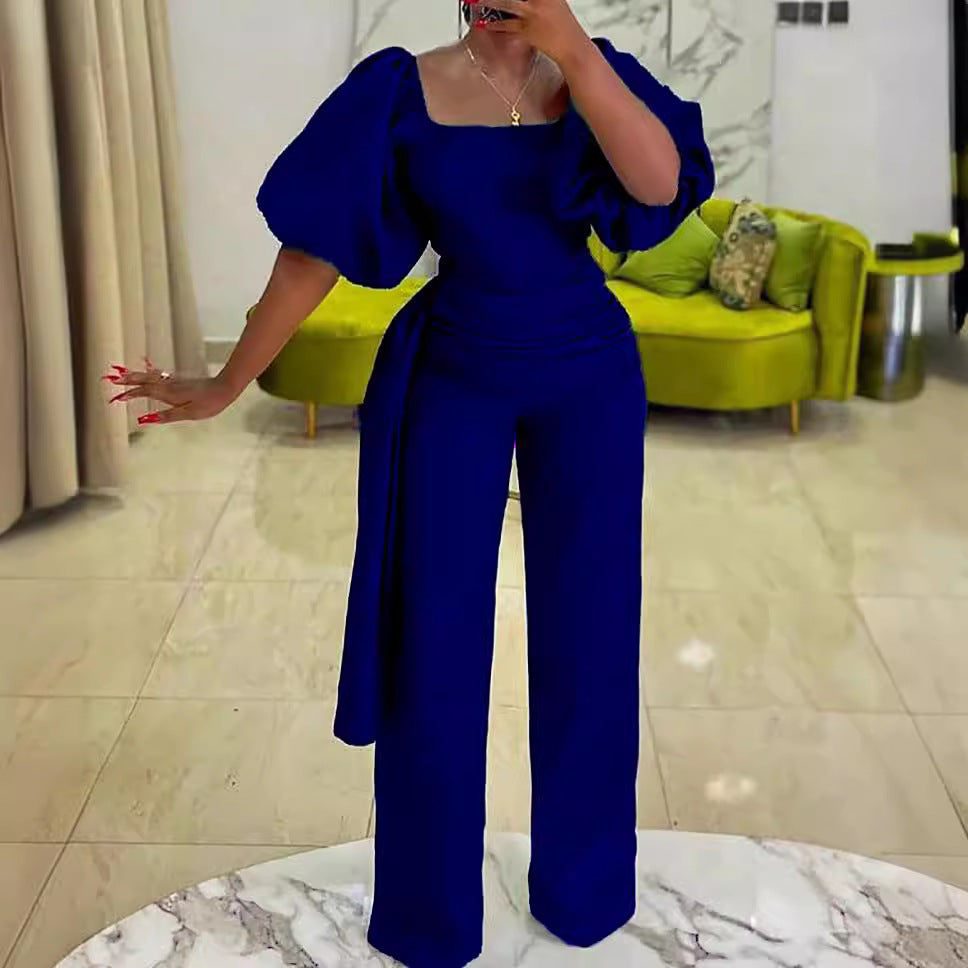 Damen eleganter Jumpsuit mit tailliertem Schnitt und voluminösen Puffärmeln Stalluxe