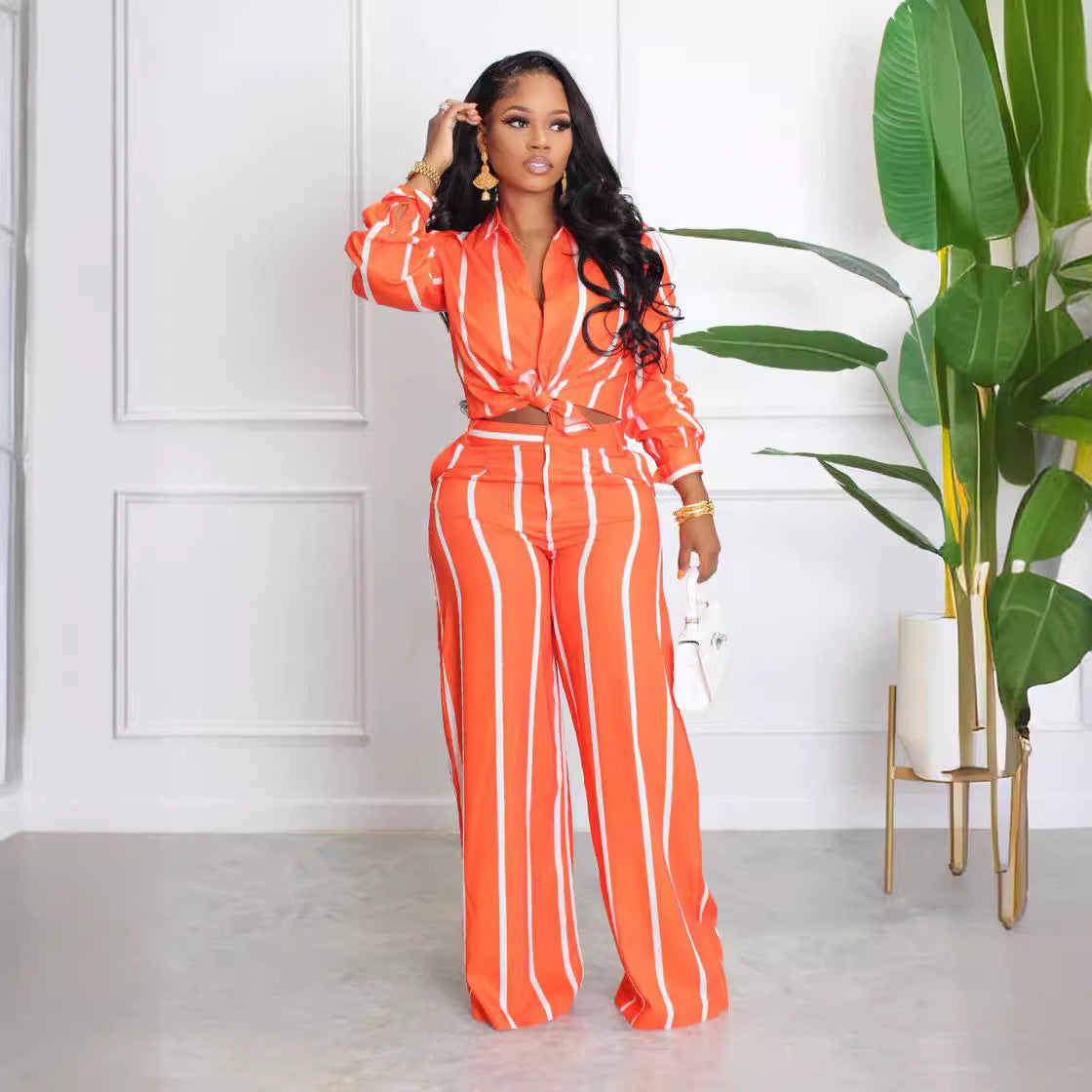Damen Elegantes gestreiftes Set mit Bluse und Palazzo-Hose Stalluxe