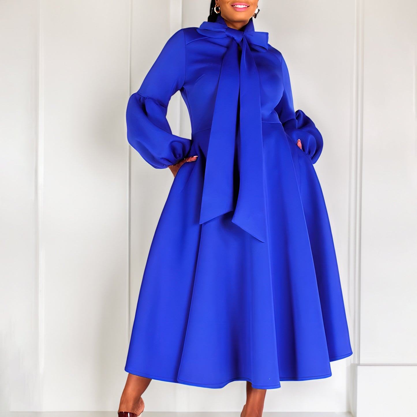 Damen Midikleid mit eleganten Schleifenärmeln und schwingendem Rock Stalluxe