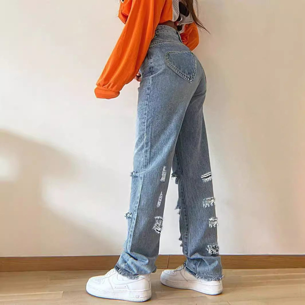 Damen Flared Jeans mit modischen Rissdetails und fransigem Saum Stalluxe