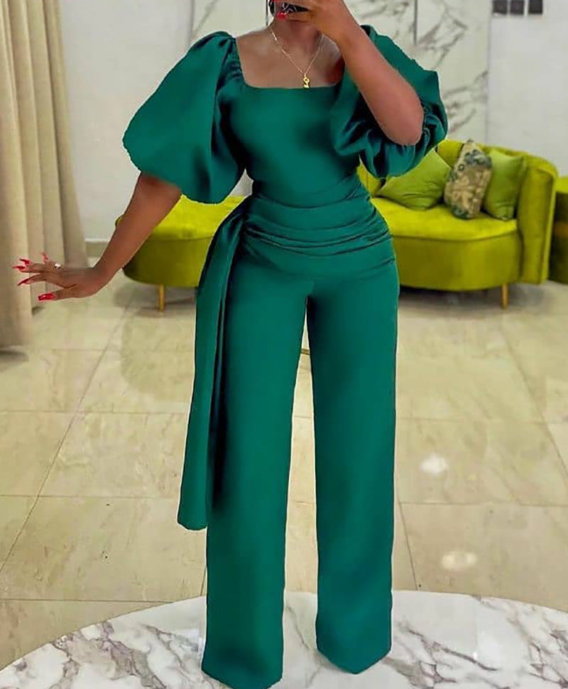 Damen eleganter Jumpsuit mit tailliertem Schnitt und voluminösen Puffärmeln Stalluxe