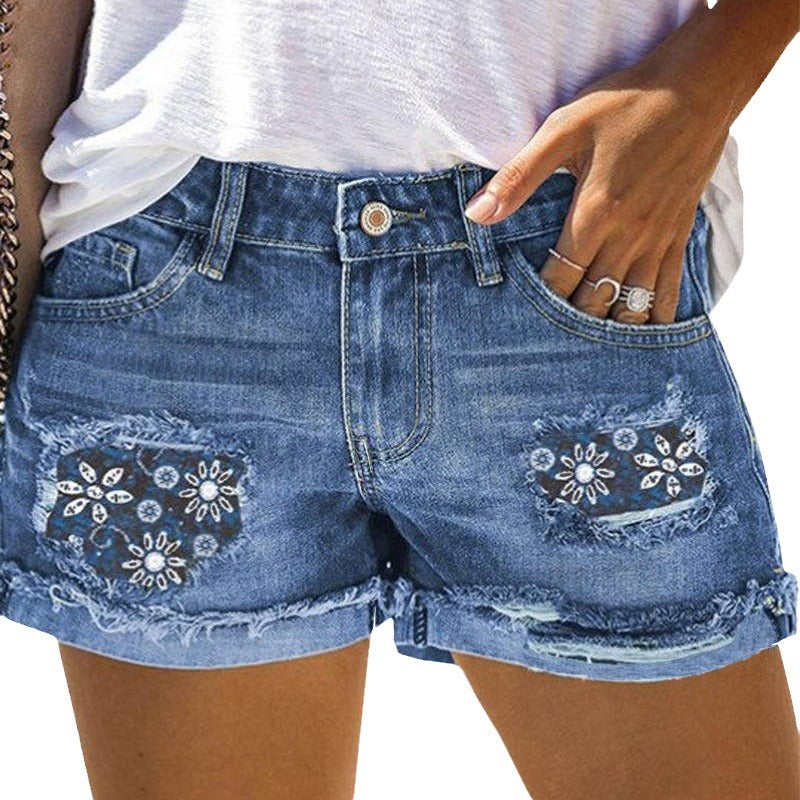 Damen Jeansshorts mit modischem Stickdesign und fransigen Säumen Stalluxe