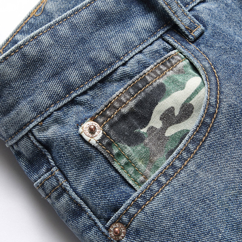Herren Ripped Denim-Jeans mit kreativen Farbklecksen und lässigem Schnitt Stalluxe