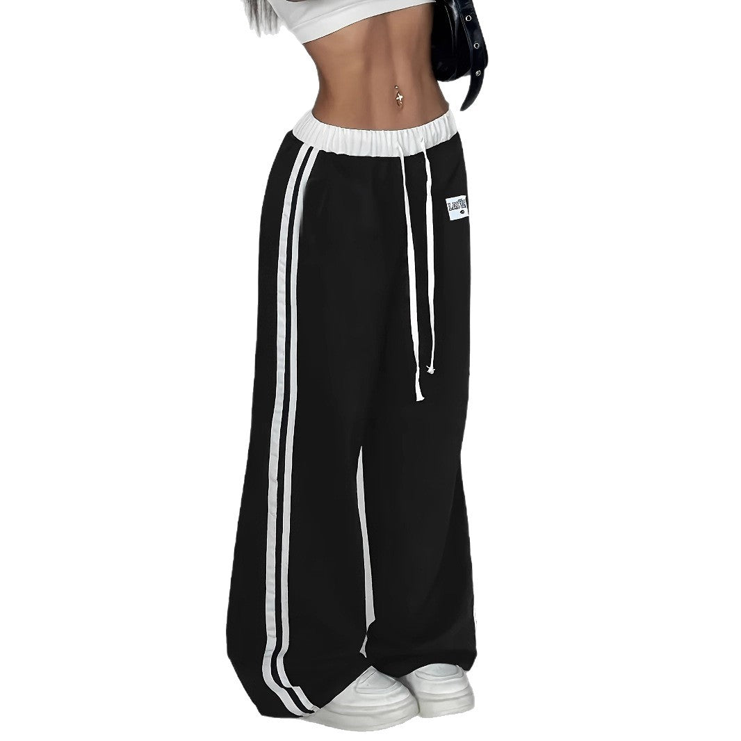 Damen Sportliche weit geschnittene Freizeithose mit elastischem Bund und seitlichen Streifen Stalluxe