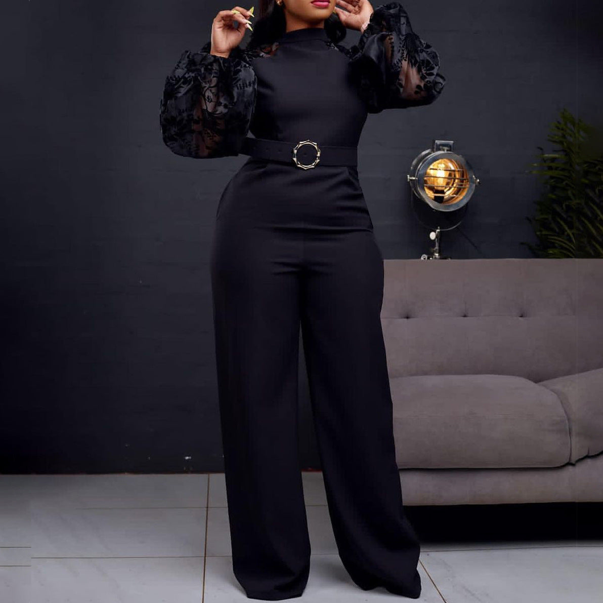Damen Eleganter Jumpsuit mit transparenten Puffärmeln und tailliertem Gürtel Stalluxe