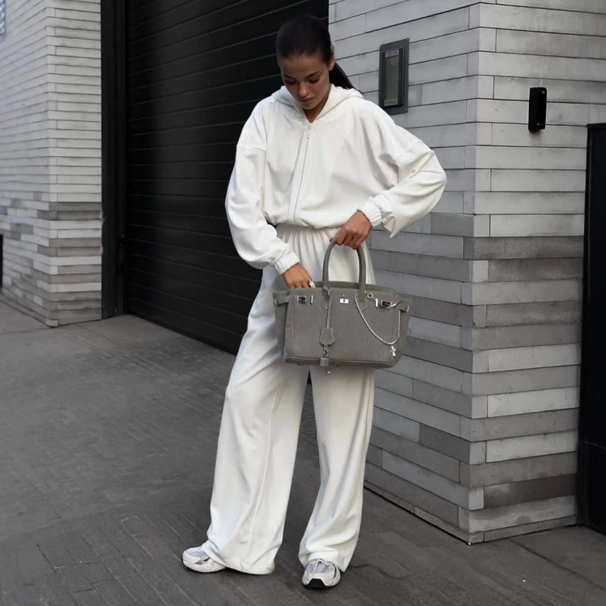 Damen Lässiger Fleece-Jumpsuit mit Kapuze und praktischen Taschen Stalluxe
