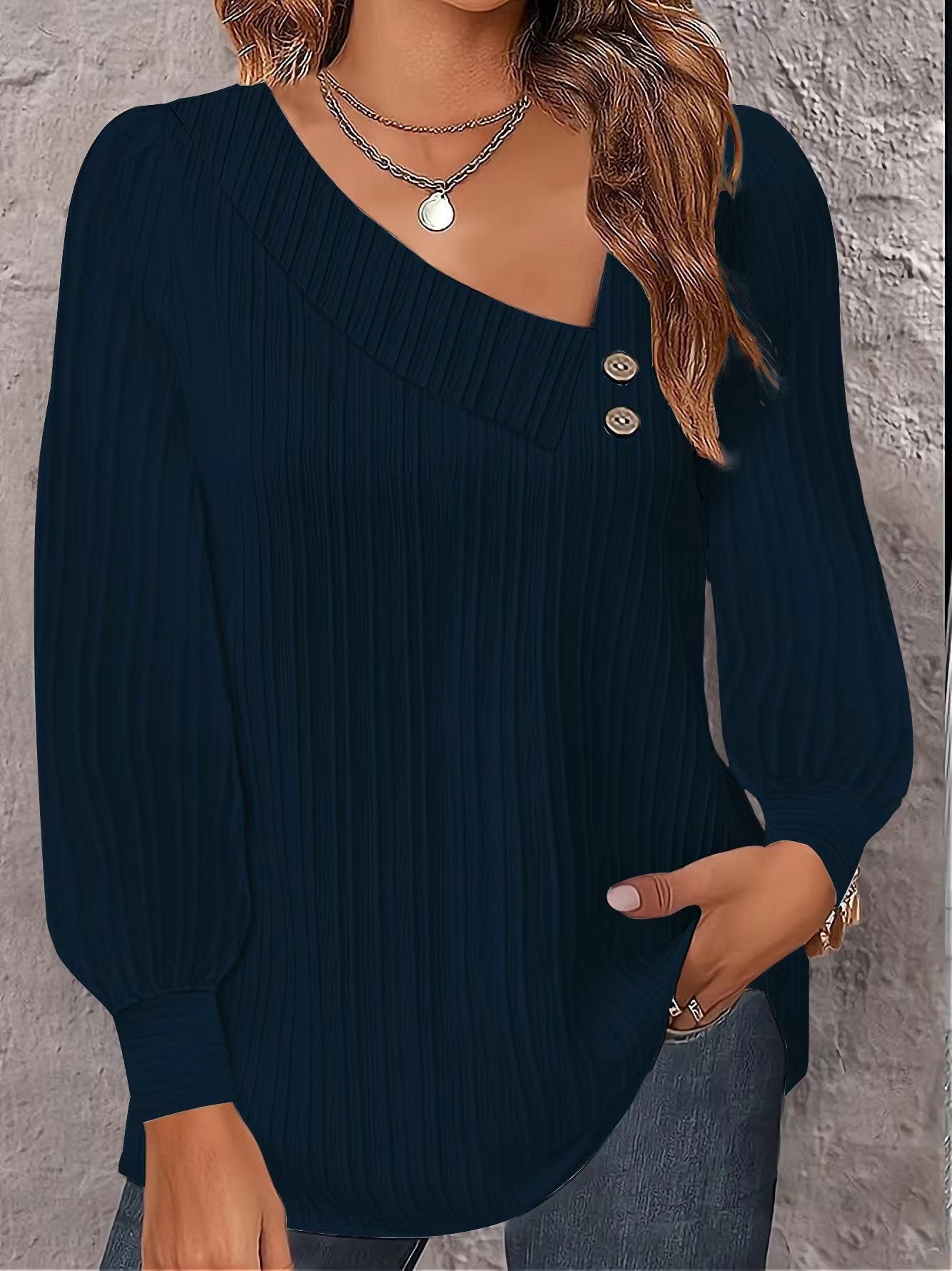 Damen Modisches Langarmshirt mit plissierter Textur und dekorativen Knöpfen Stalluxe