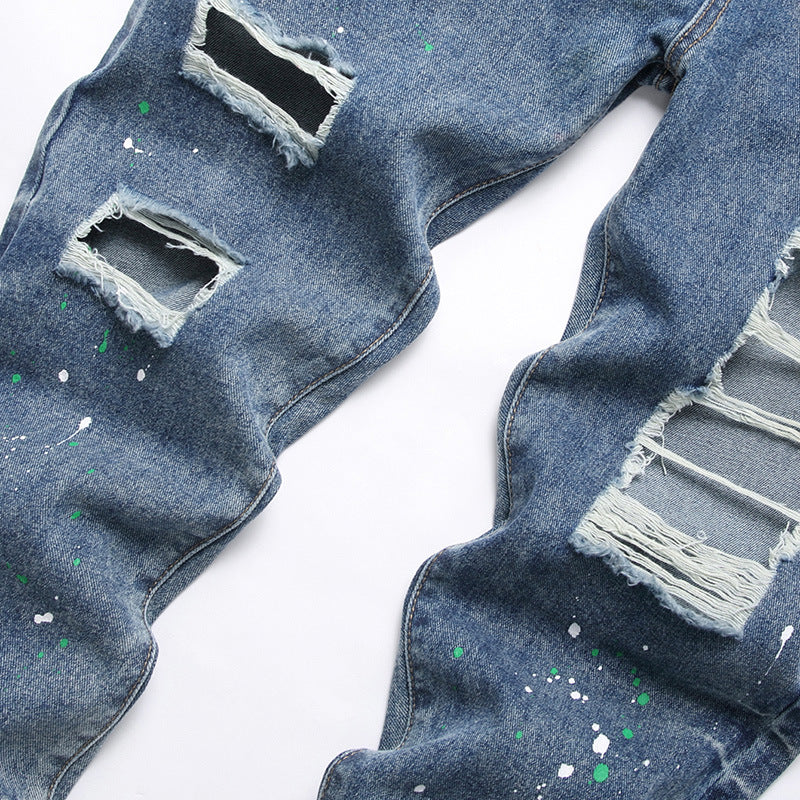 Herren Ripped Denim-Jeans mit kreativen Farbklecksen und lässigem Schnitt Stalluxe