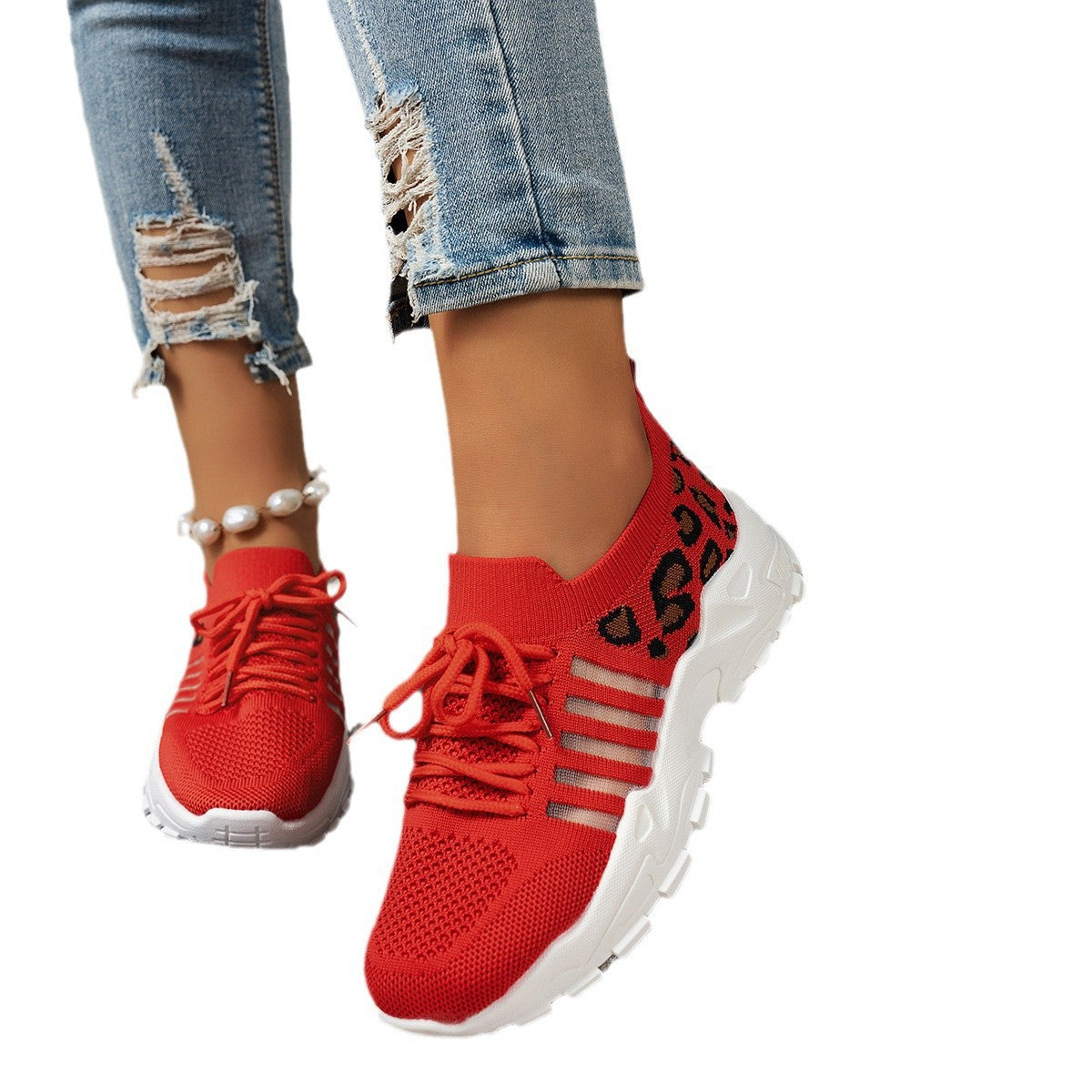 Damen Sportliche Sneakers aus atmungsaktivem Strickmaterial mit auffälligem Leopardenmuster Stalluxe
