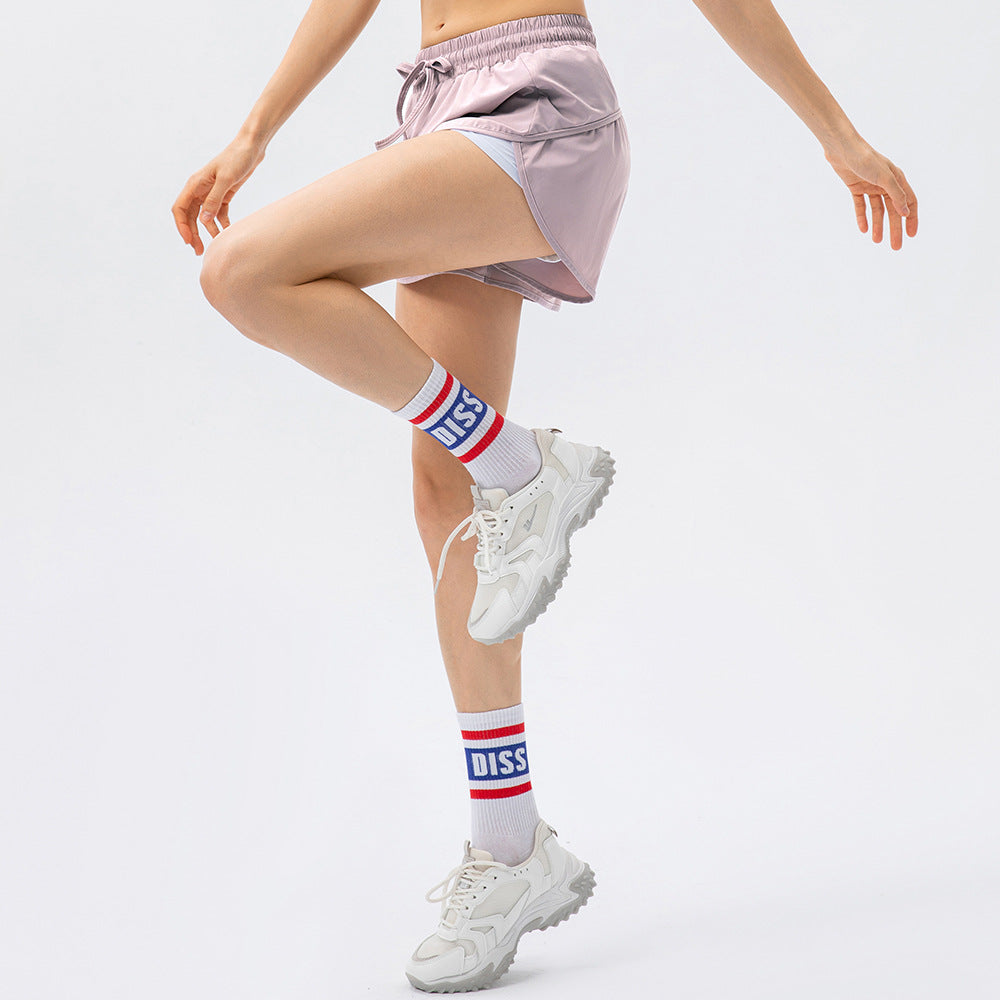 Damen Sportliche Laufshorts mit elastischem Bund und seitlichen Schlitzen Stalluxe