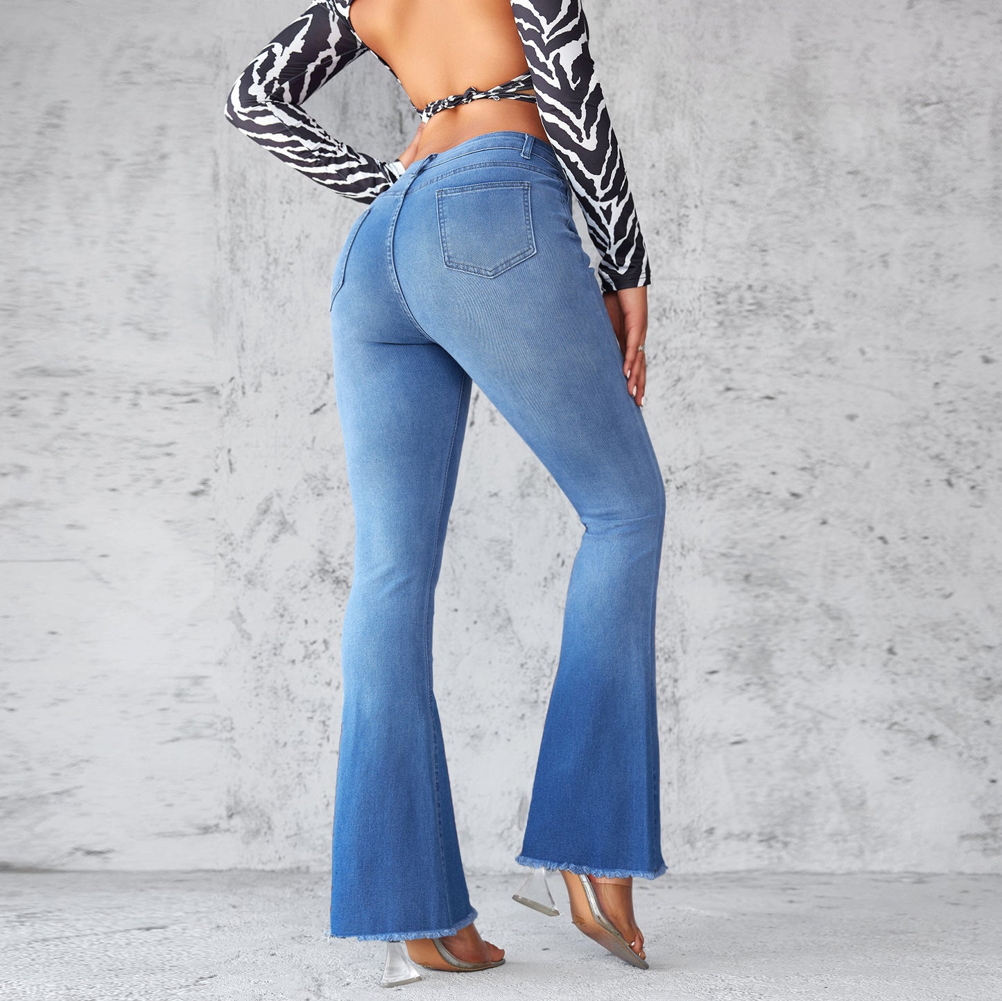 Damen Flared Jeans mit hohen Bund und ausgefranstem Saum Stalluxe
