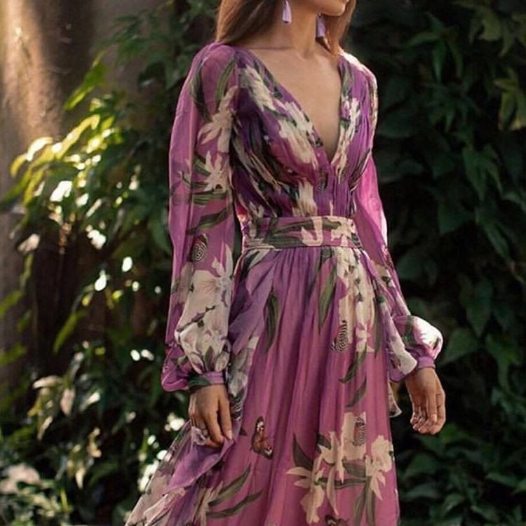 Damen Maxikleid mit tiefem V-Ausschnitt, floralem Design und schwingendem Rock Stalluxe
