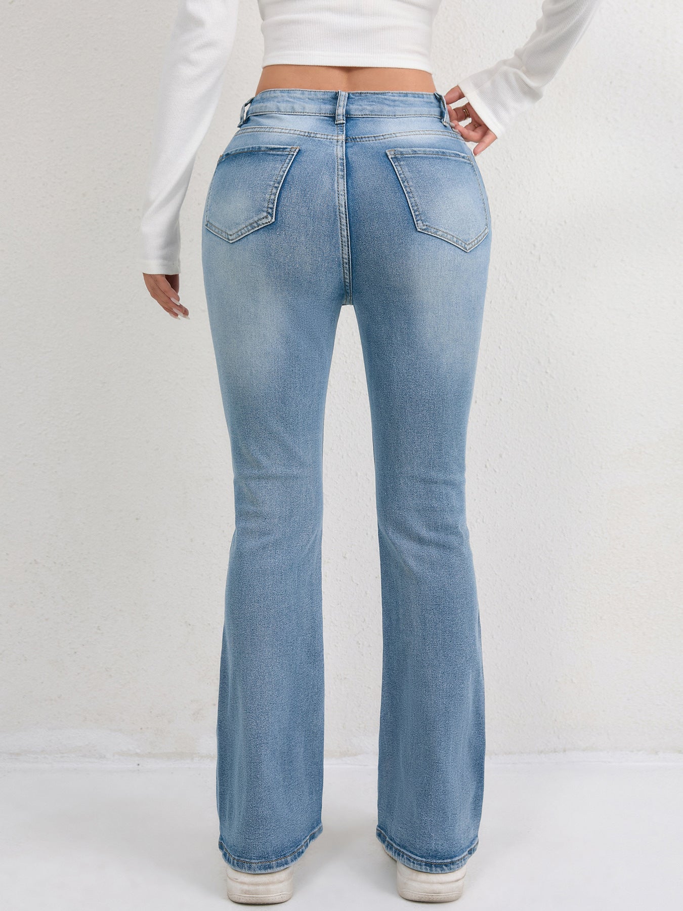 Damen Schlagjeans mit hohem Bund und figurformendem Design Stalluxe