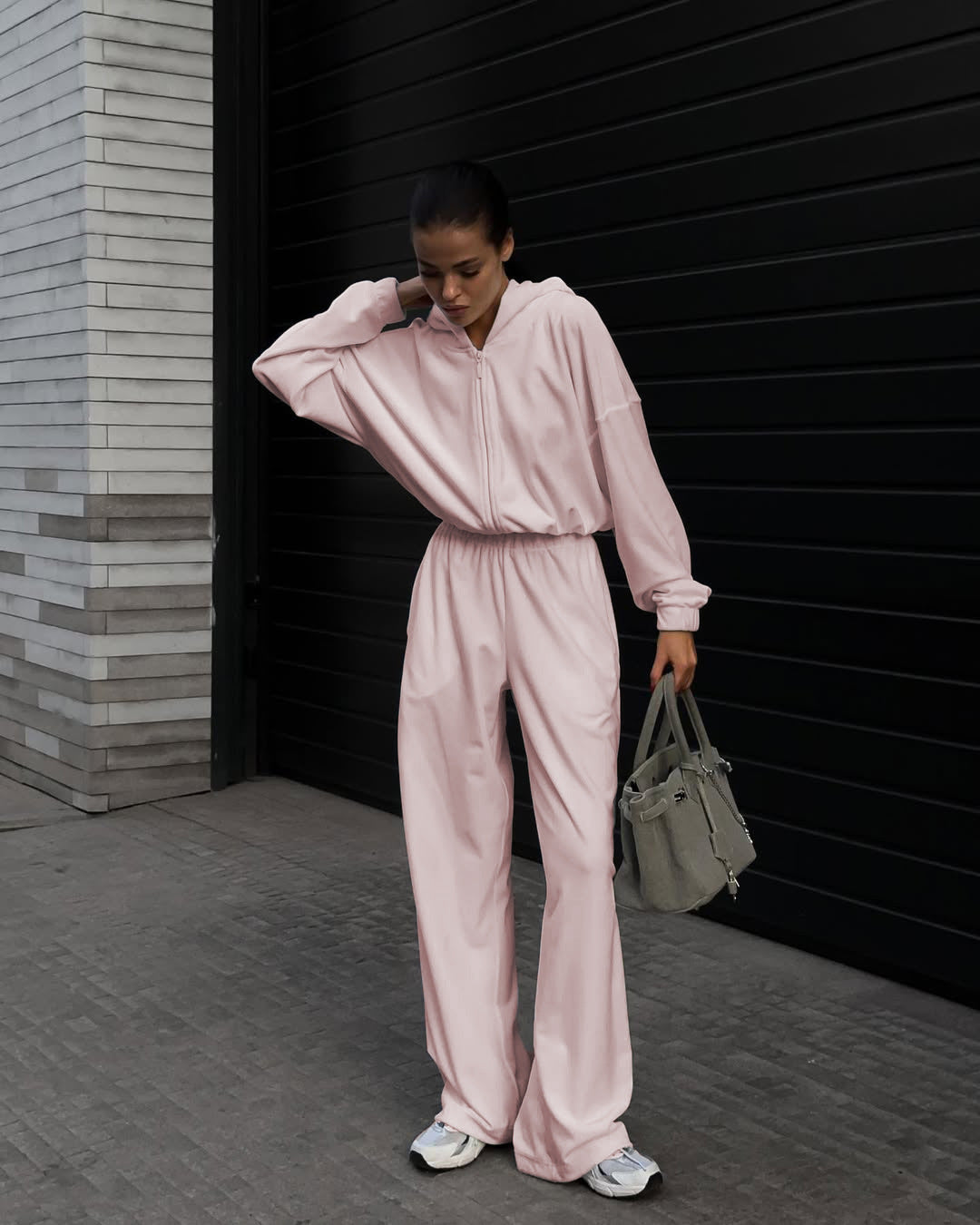 Damen Lässiger Fleece-Jumpsuit mit Kapuze und praktischen Taschen Stalluxe