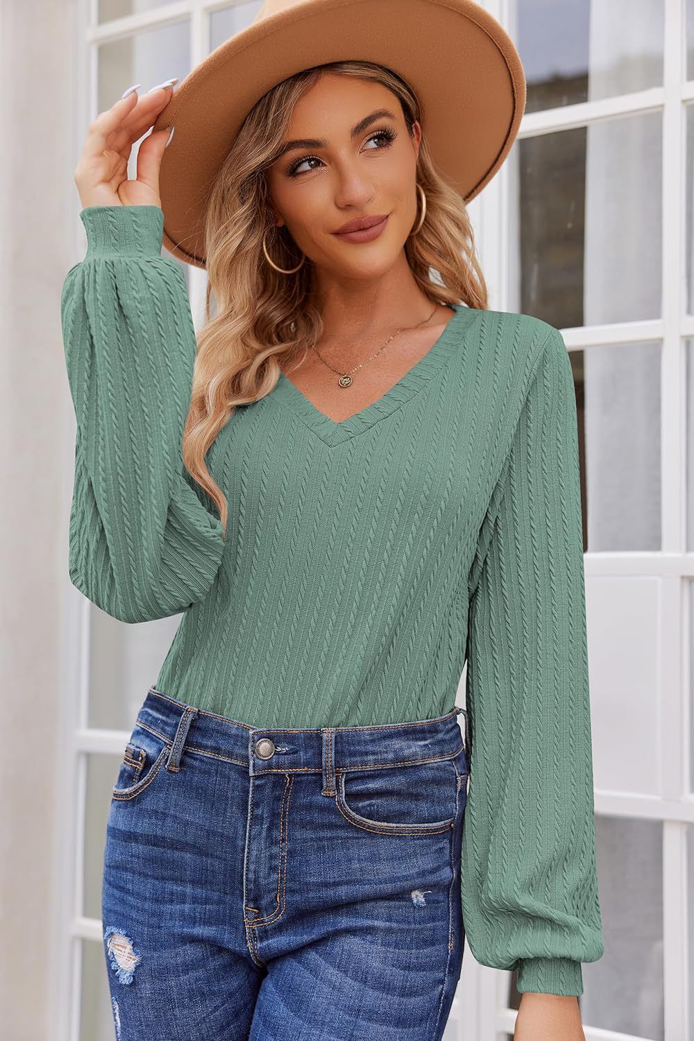 Damen Strickbluse mit feiner Rippstruktur und lässigem V-Ausschnitt Stalluxe