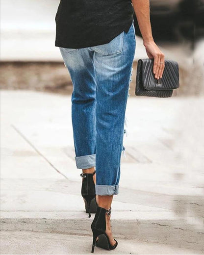 Damen Ripped Jeans im modernen Slim-Fit Schnitt mit fransigen Details Stalluxe
