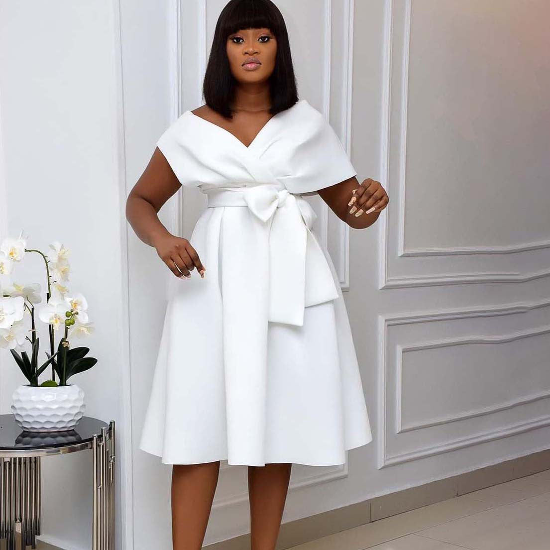 Damen Wickelkleid mit fließendem Schnitt und praktischen Taschen Stalluxe