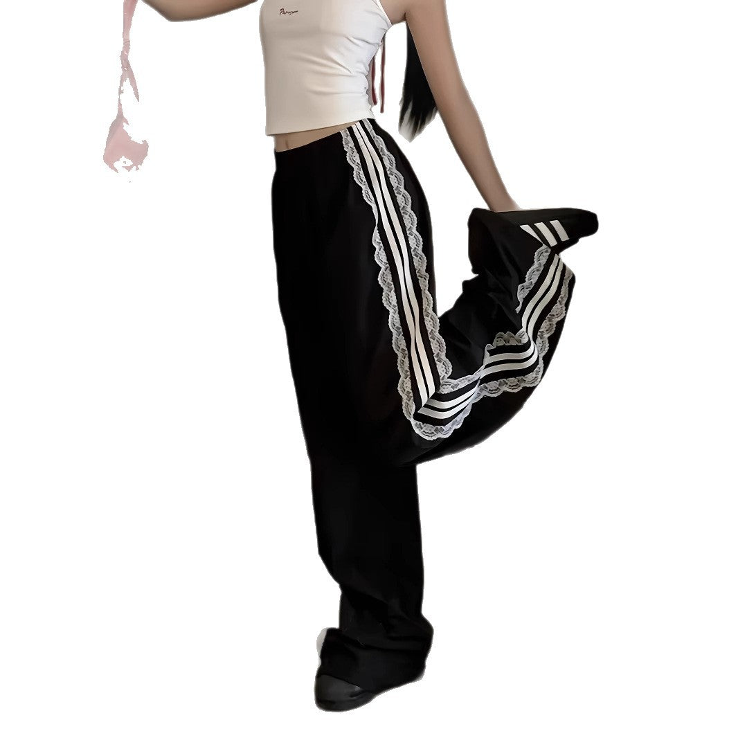 Damen lockere Sporthose mit praktischen Seitentaschen und dekorativen Streifen Stalluxe