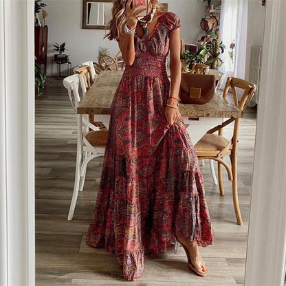 Damen Maxikleid mit tiefem V-Ausschnitt und femininem Muster Stalluxe