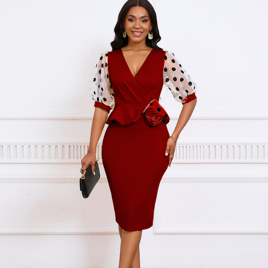 Damen Wickelkleid mit voluminösen Puffärmeln und floralen Akzenten Stalluxe