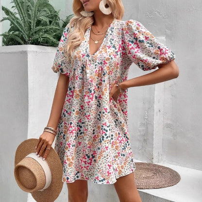 Damen Verspieltes Blümchenkleid mit Puffärmeln und V-Ausschnitt Stalluxe
