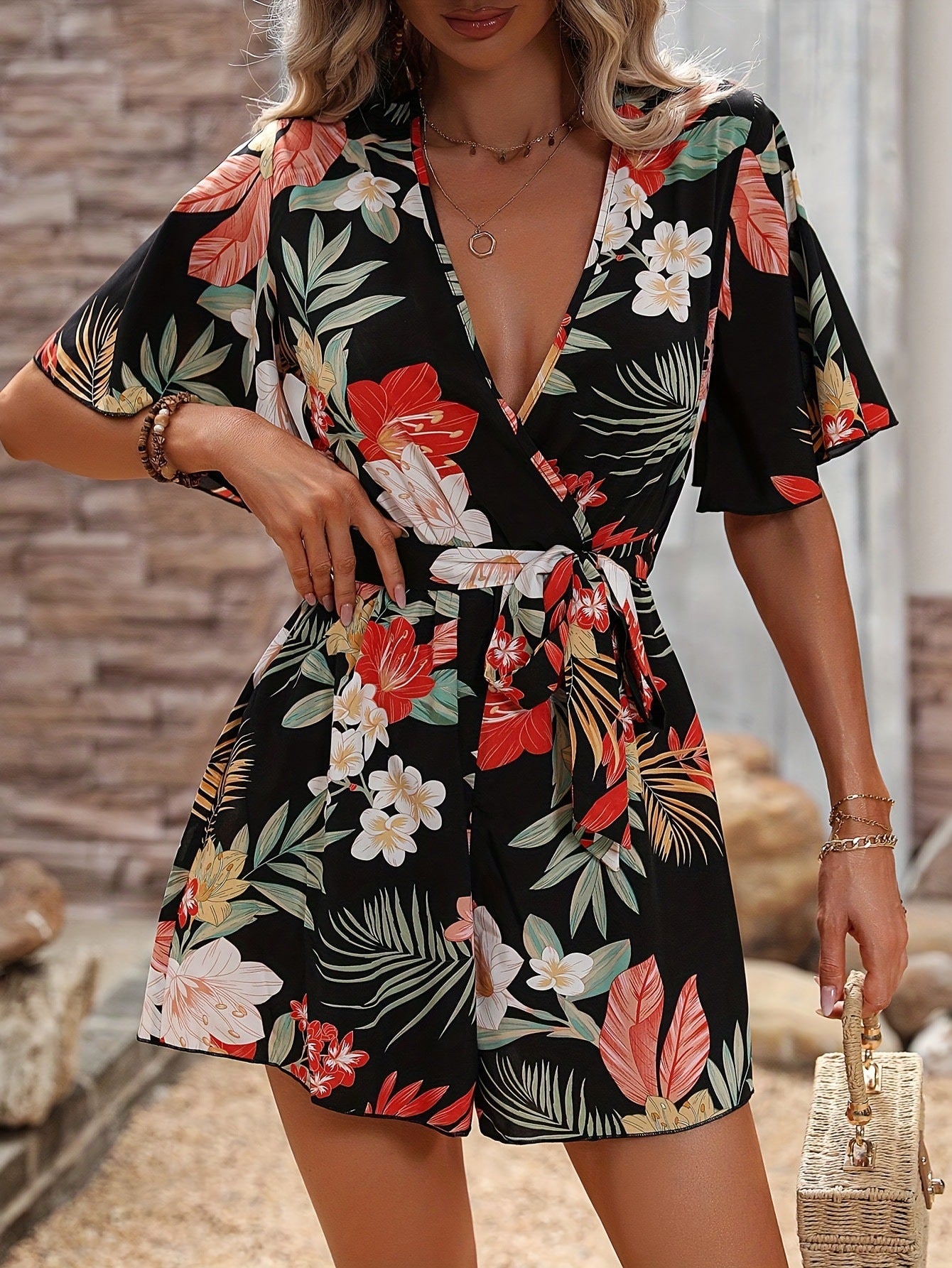 Damen Blumendesignd Jumpsuit mit Wickeloptik und Taillengürtel Stalluxe