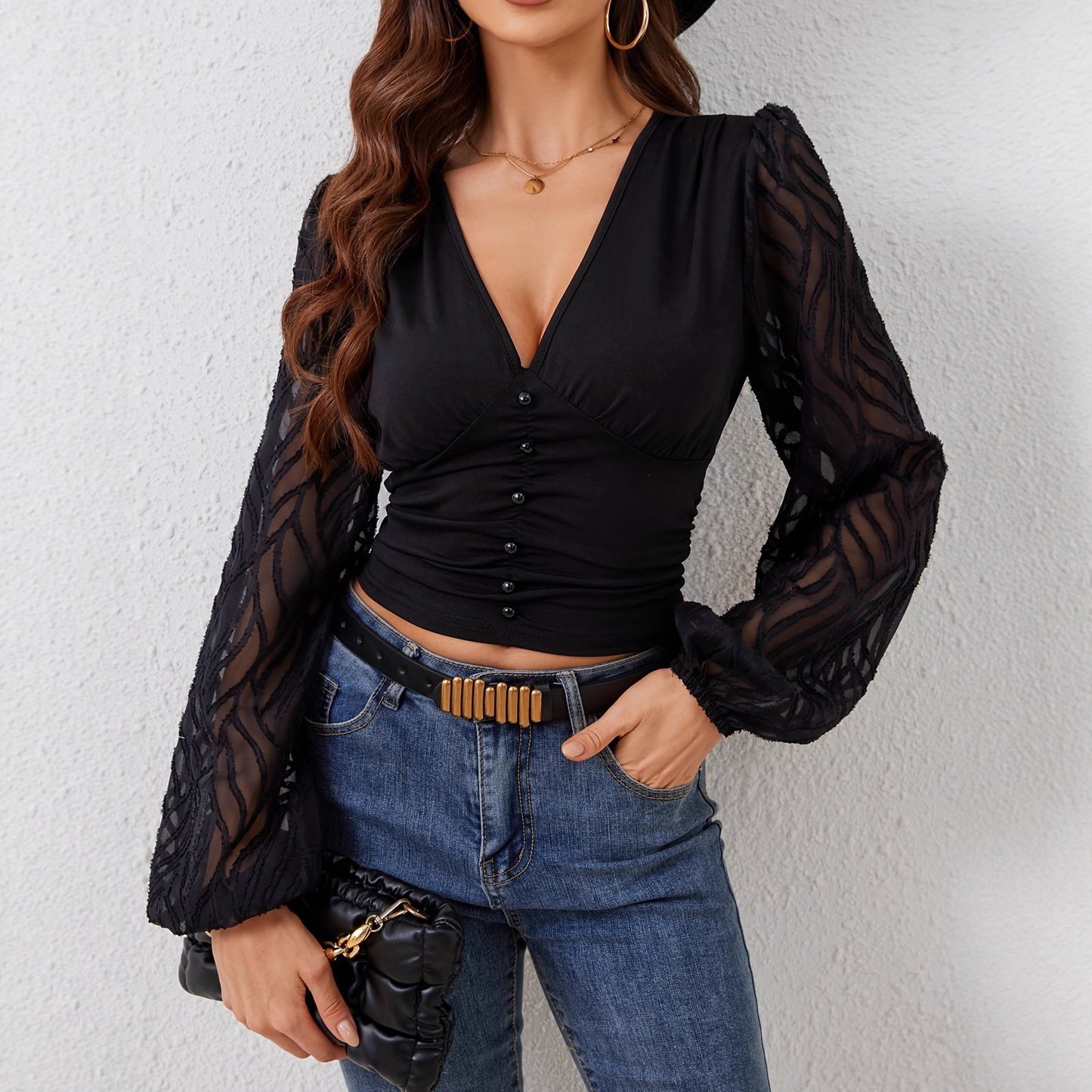 Damen Bluse mit eleganten, transparenten Ärmeln und knopfverzierten Details Stalluxe