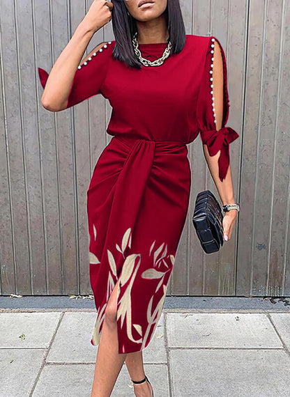 Damen Midikleid mit floralen Details und eleganten Schlitz Stalluxe