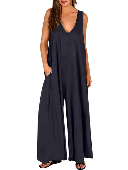 Damen Luftiger Jumpsuit mit tiefem V-Ausschnitt und seitlichen Taschen Stalluxe