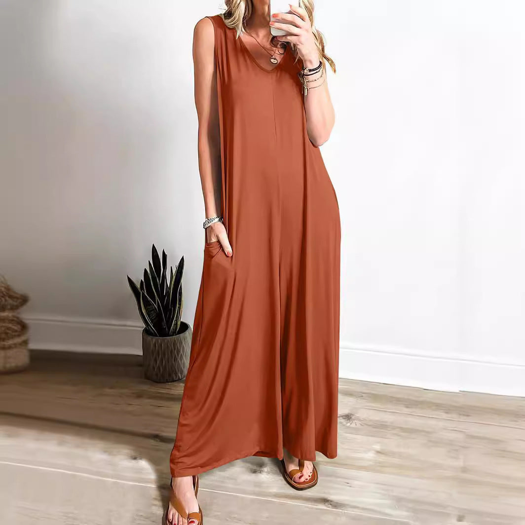 Damen Luftiger Jumpsuit mit tiefem V-Ausschnitt und seitlichen Taschen Stalluxe