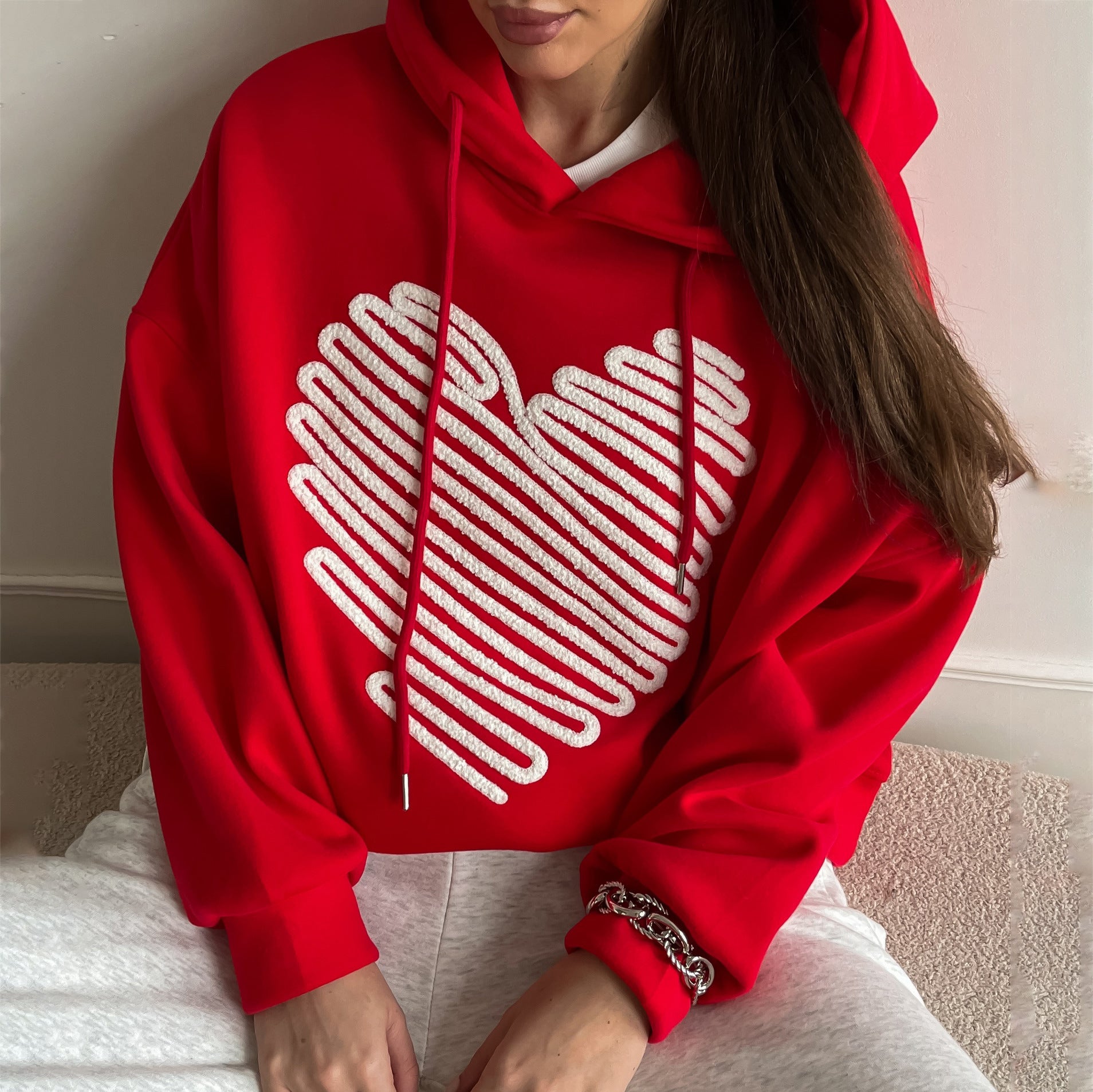 Damen Kapuzenpullover mit kreativem Herzdesign und lässigem Schnitt Stalluxe Rot