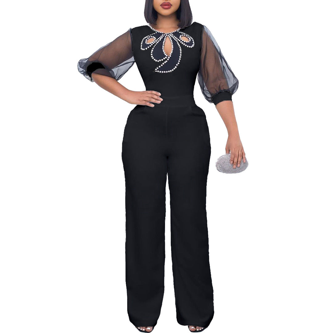 Damen eleganter Jumpsuit mit transparenten Ärmeln und Perlenverzierung Stalluxe