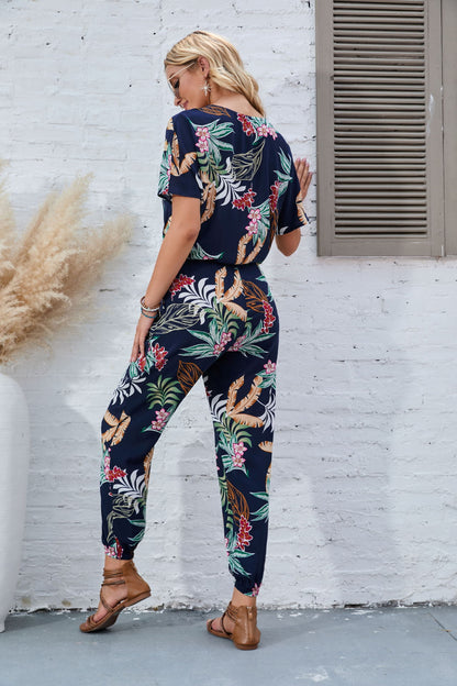 Damen Freizeit-Jumpsuit mit floralem Muster und taillierten Bändern Stalluxe