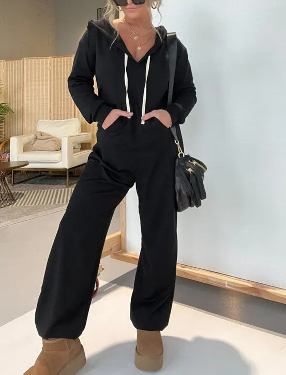 Damen bequemer Hoodie-Jumpsuit mit tiefem V-Ausschnitt und Kordelzug Stalluxe