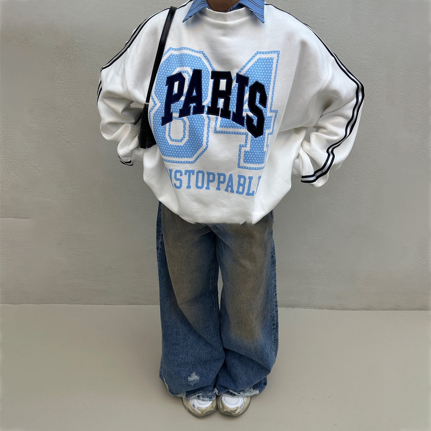 Damen Oversized Sweatshirt mit modischem Paris-Print und gestreiften Akzenten Stalluxe