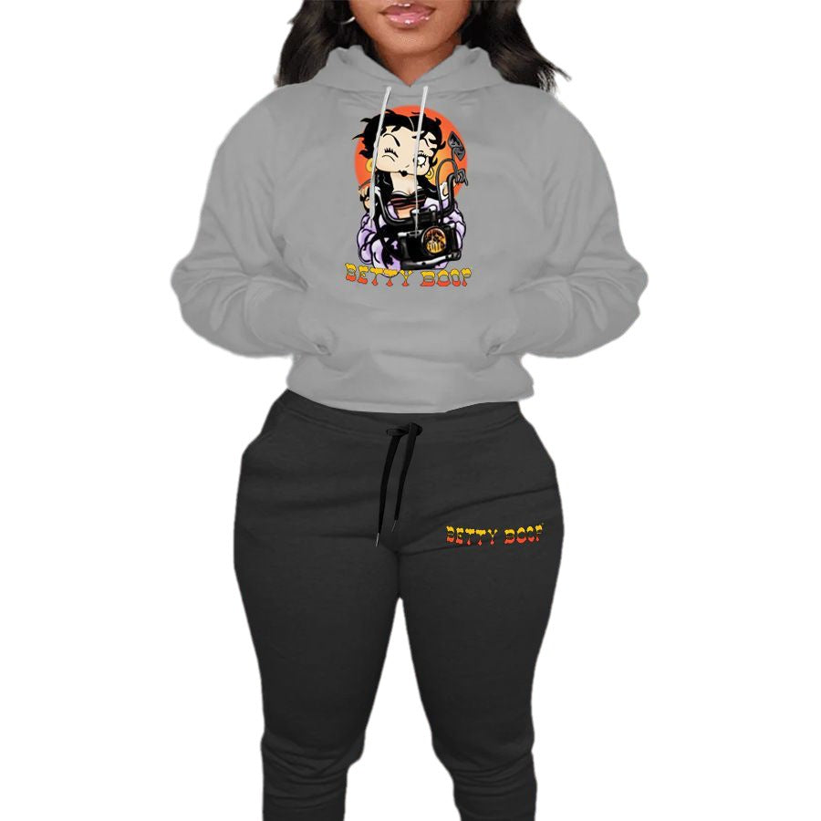 Damen modernes Kapuzenpullover und lässige Jogginghose Set mit künstlerischem Cartoon-Druck Stalluxe
