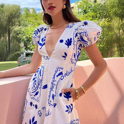 Damen Maxikleid mit voluminösen Puffärmeln und floralen Mustern Stalluxe