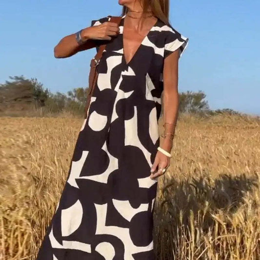 Damen lässiges Maxikleid mit kreativem Muster und tiefem V-Ausschnitt Stalluxe