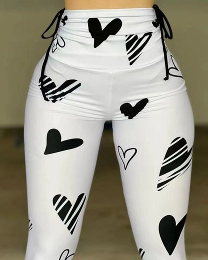 Damen Hochbund-Leggings mit grafischem Herzmuster und hochelastischem Material Stalluxe