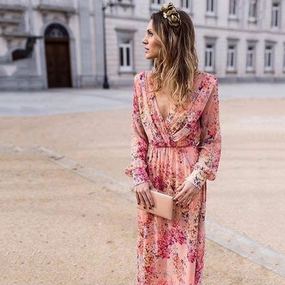 Damen Maxikleid mit voluminösen Ärmeln und elegantem floralem Design Stalluxe