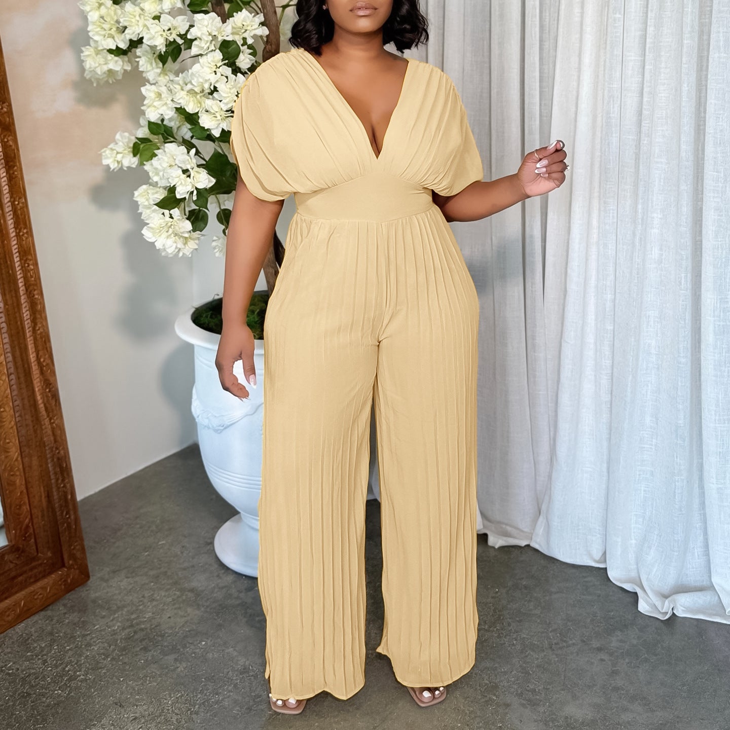 Damen Plissees Jumpsuit mit voluminösen Ärmeln Stalluxe