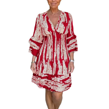 Damen Wickelkleid mit voluminösen Ärmeln und dekorativem Muster Stalluxe